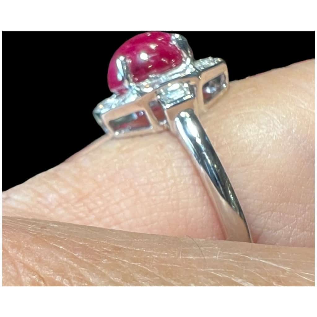 18 Carat Gold Ring Set With A Ruby Cabochon Surrounded By Diamonds 7