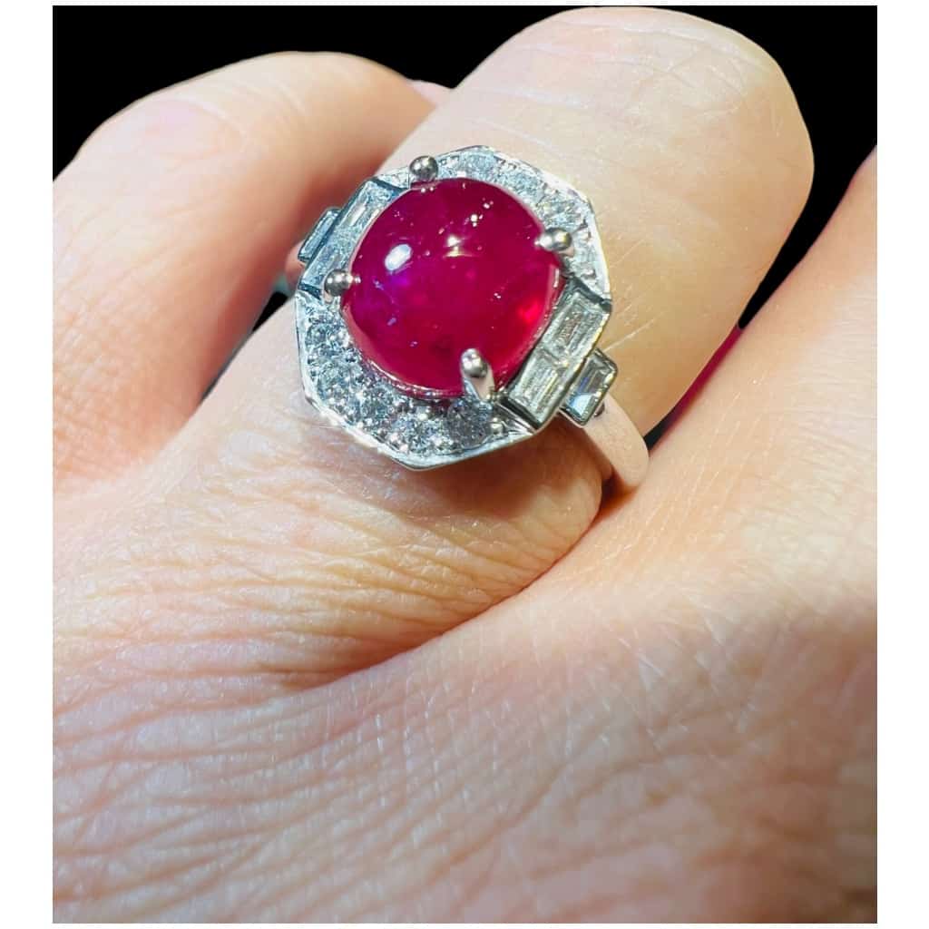 18 Carat Gold Ring Set With A Ruby Cabochon Surrounded By Diamonds 6