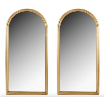 1960 Pair of molded and gilded wood mirrors inspired by a Romanesque arch.