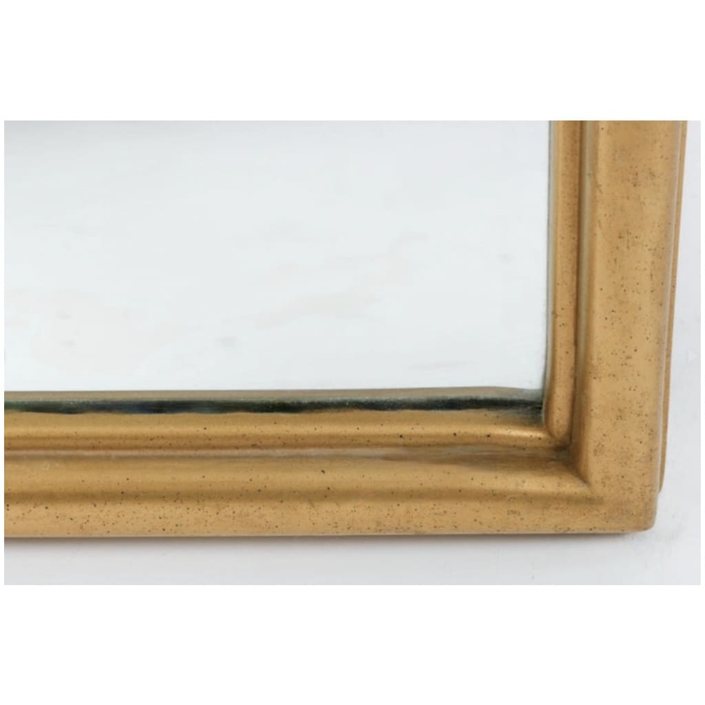 1960 Paire de miroirs en bois mouluré et doré inspirés d’une ogive romane. 4
