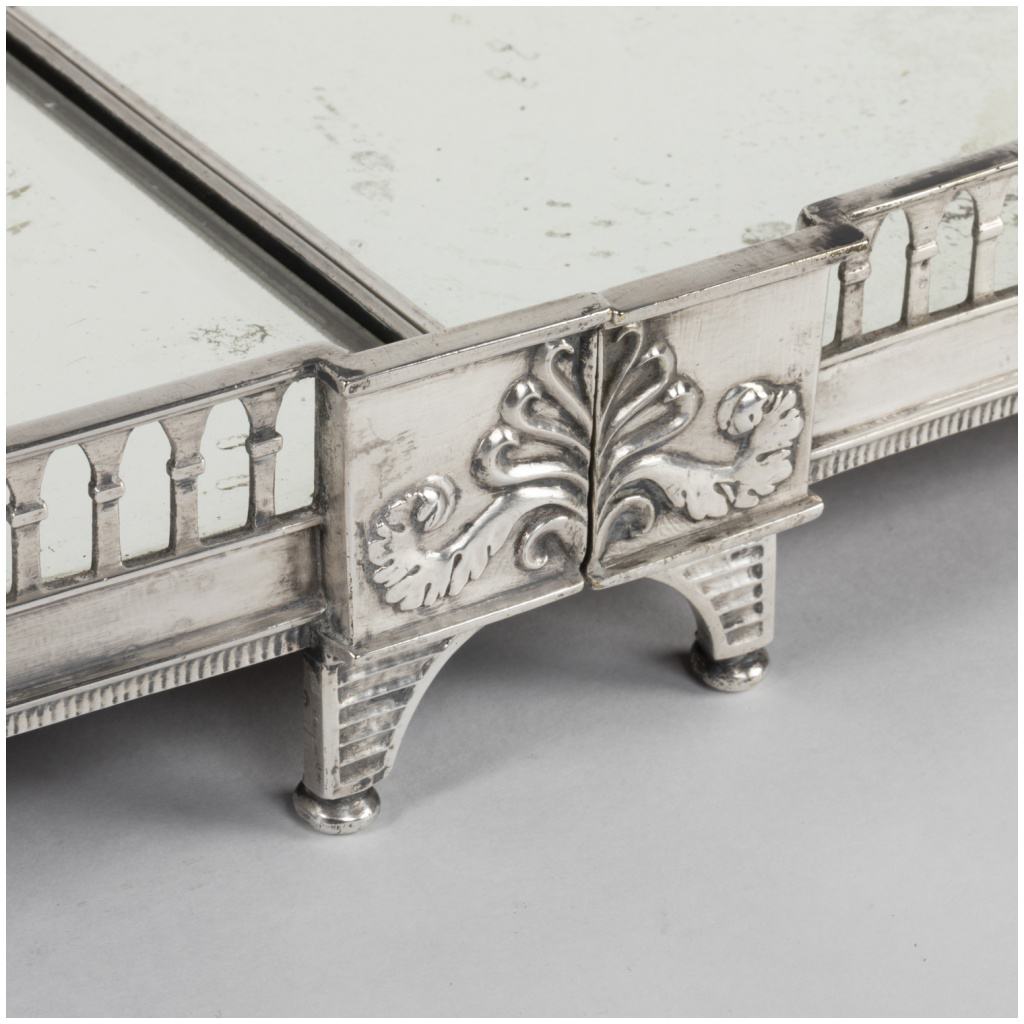 Above all table in five parts in silvered bronze, chiseled and engraved, mirror background, XIXe 12