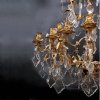 Lustre de style Louis XV à 36 flambeaux en bronze doré et cristal taillé, XIXe 7