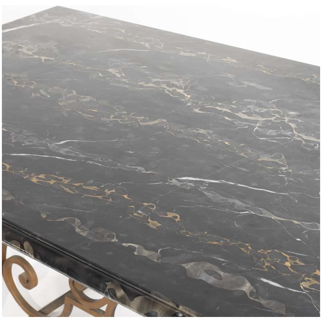 Wrought iron dining room table and portor marble top, 5th century
