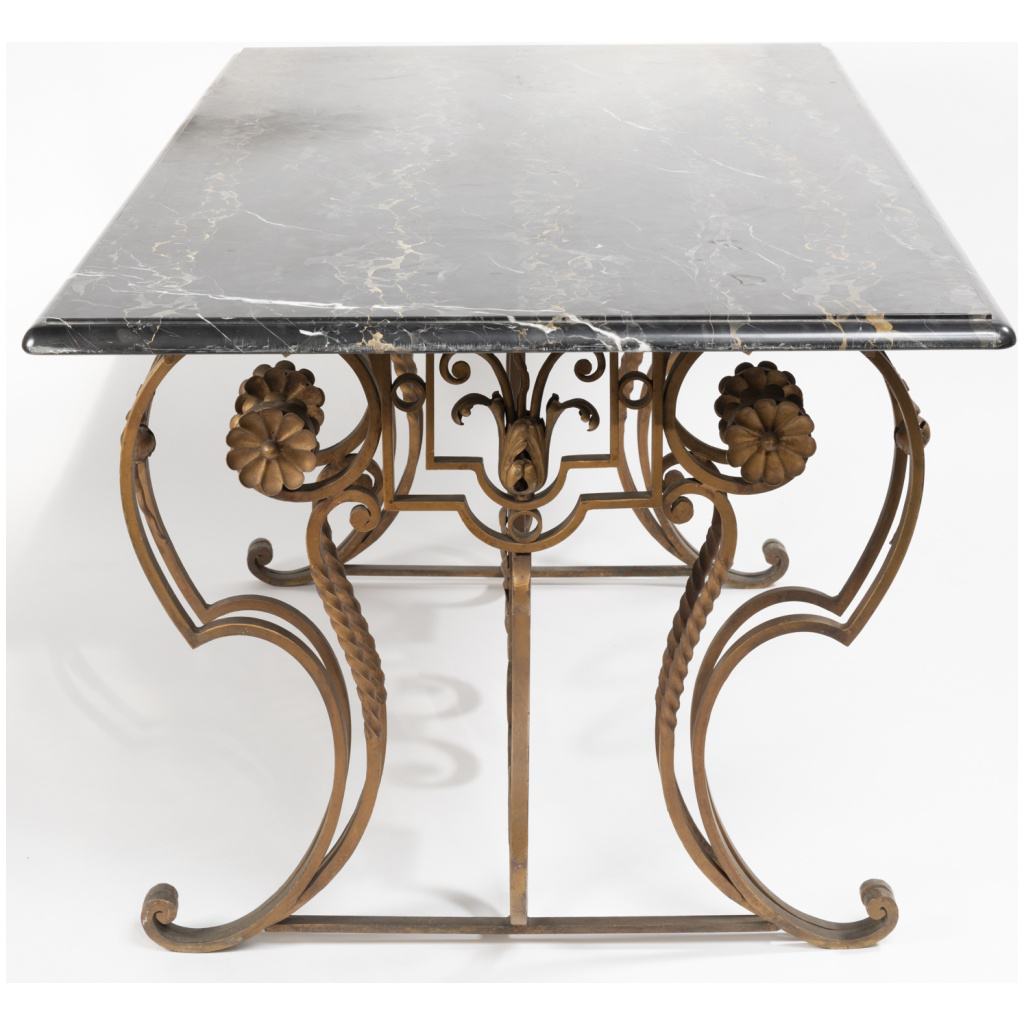 Wrought iron dining room table and portor marble top, 6th century