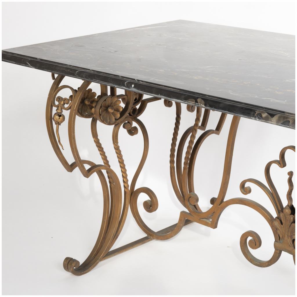 Wrought iron dining room table and portor marble top, 7th century