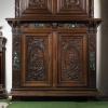 Neo-Renaissance two-body sideboard in carved walnut and marble inclusions, XVIIIand 21