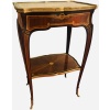 Table volante de forme chantournée à décor marqueté d’un motif rayonnant Style Louis XV 12