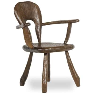 Maison Chevalier, Fauteuil Brutaliste en bois gougé. Années 1960.