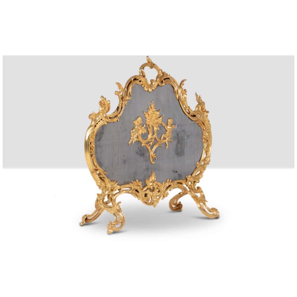 Louis XV style gilt bronze fire screen. Circa 1880. 8