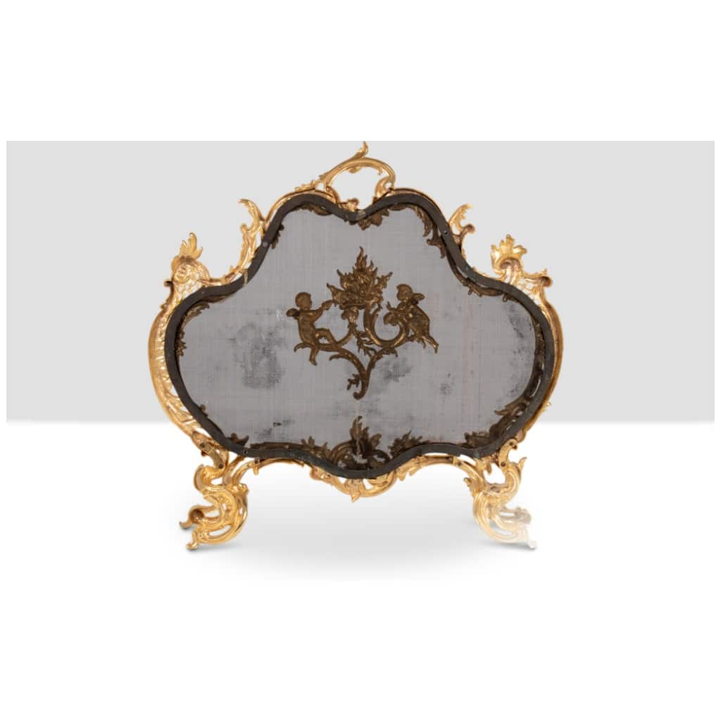 Louis XV style gilt bronze fire screen. Circa 1880. 6
