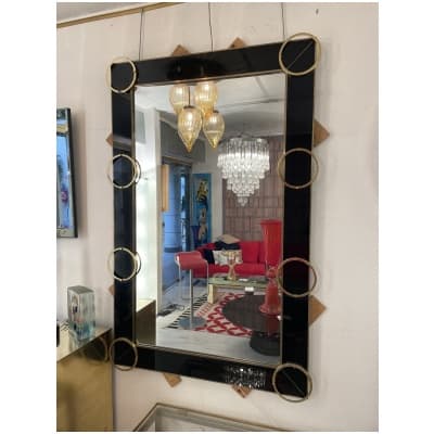 Italian mirror from the 70s in tinted glass and brass