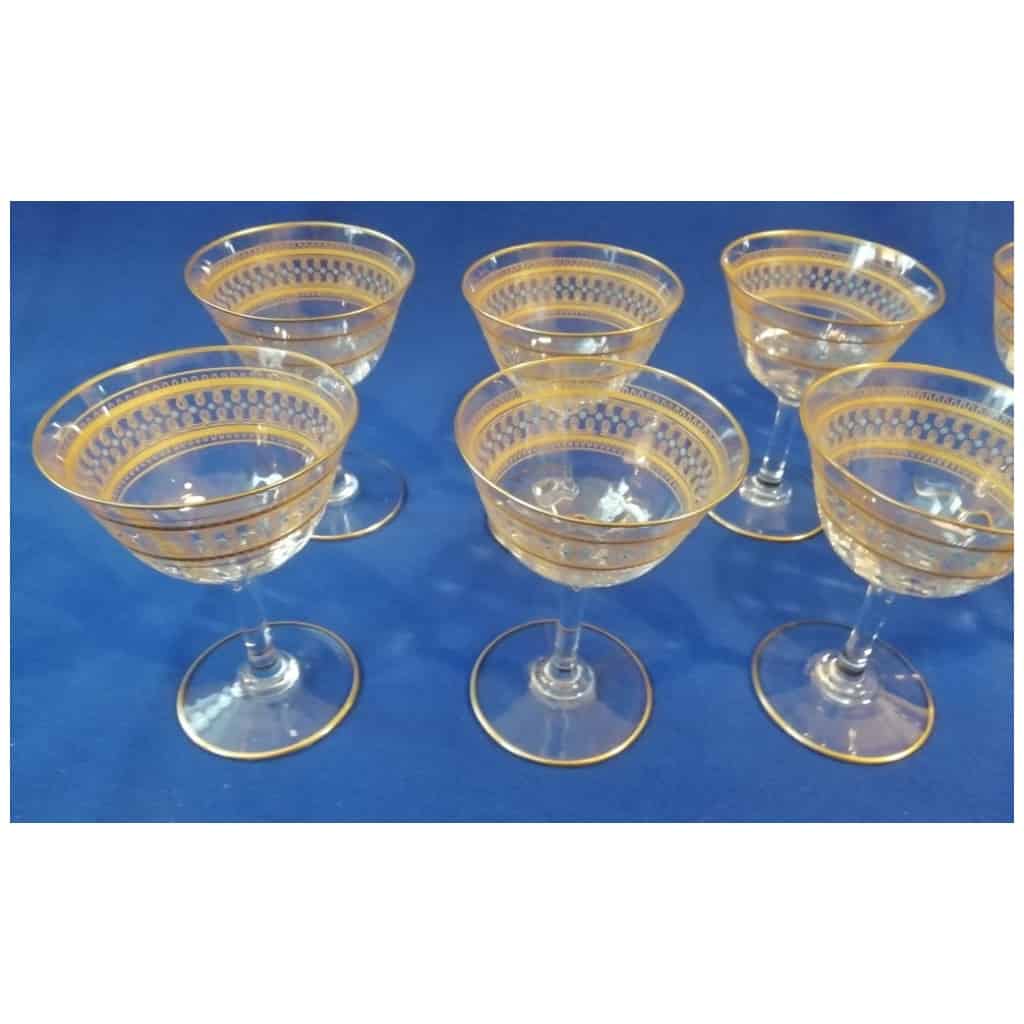 12 GLASSES or small Champagne glasses IN OLD SAINT LOUIS CRYSTAL gilded with fine gold and blue enameled. very nice model 7