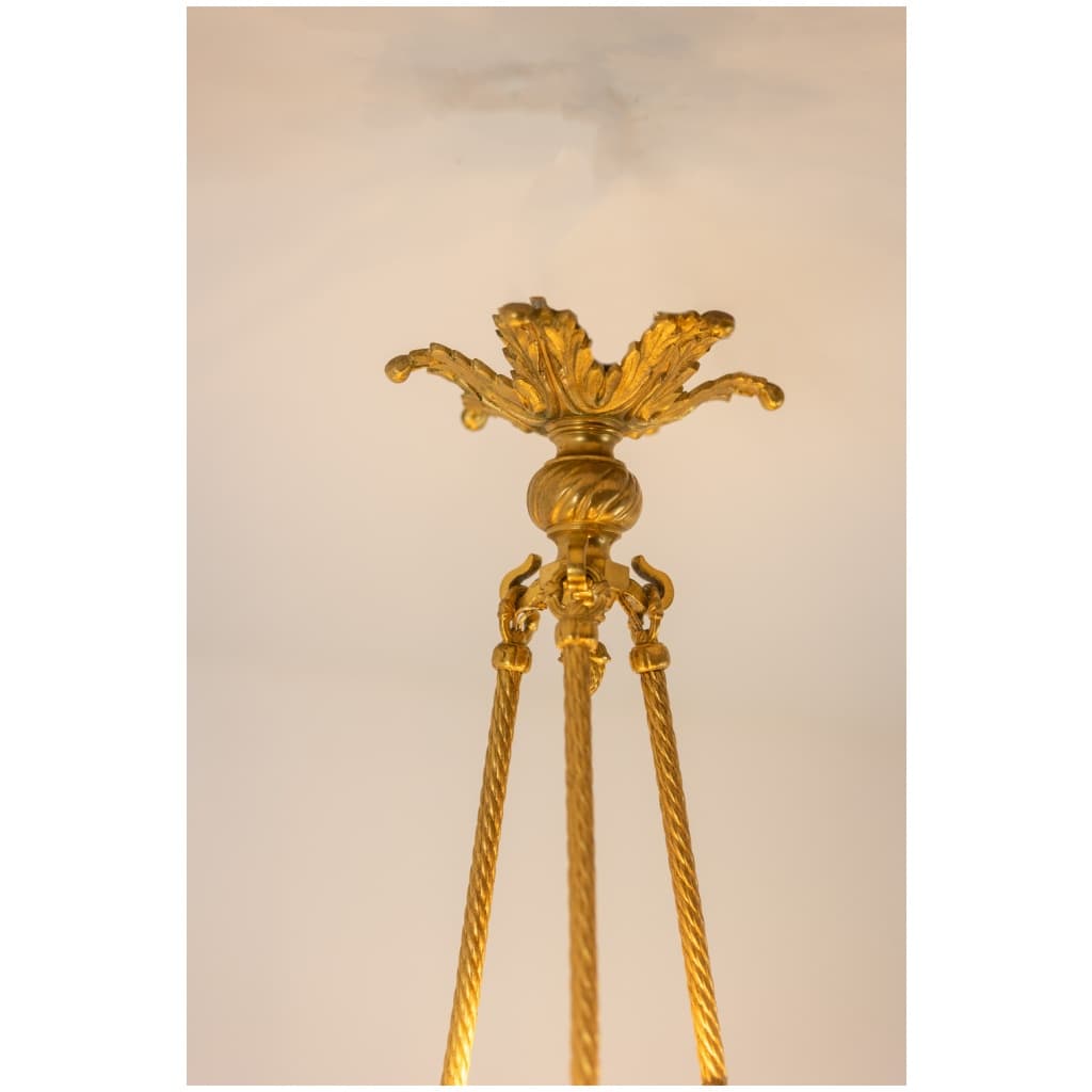 Lustre de style Louis XVI en bronze doré. Circa 1900. 12