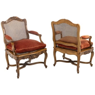 Jean Mocqué, Pair of Regency style cane armchairs, 20th century