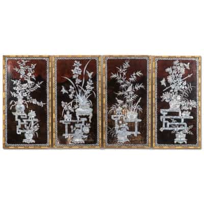 Set of four Asian-style lacquer panels. 1950s.