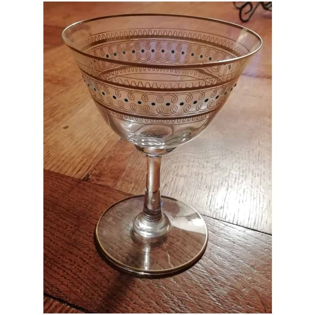 12 GLASSES or small Champagne glasses IN OLD SAINT LOUIS CRYSTAL gilded with fine gold and blue enameled. very nice model 4
