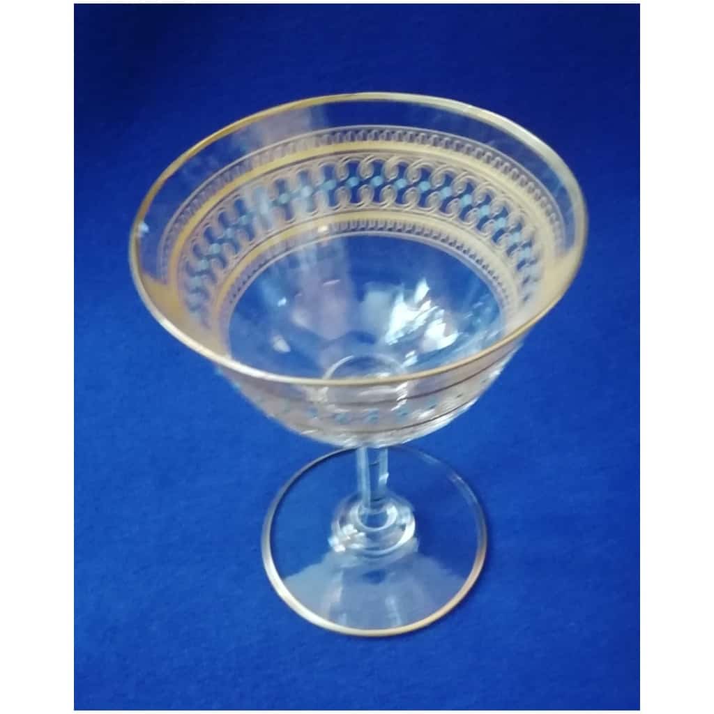 12 GLASSES or small Champagne glasses IN OLD SAINT LOUIS CRYSTAL gilded with fine gold and blue enameled. very nice model 5
