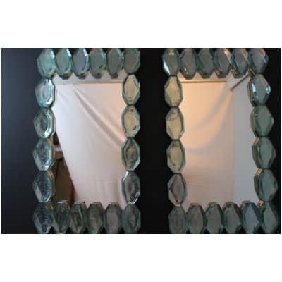 Large mirrors in blocks of water green Murano glass, cut into facets