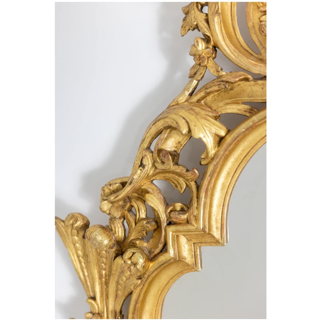 Miroir de style Régence en bois sculpté et doré. Années 1950. 8