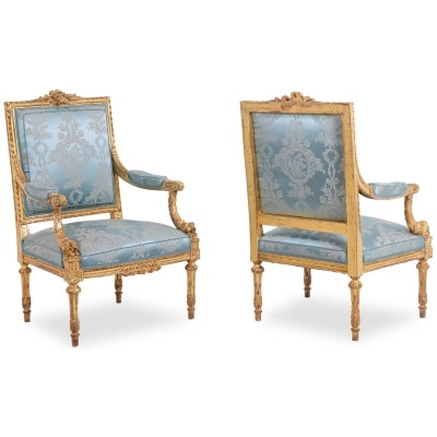 Pair of Louis style armchairs XVI in gilded and carved wood. Circa 1880.