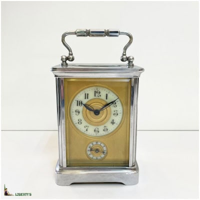 Chromed bronze cage clock with alarm clock, high. 11cm, (End XIXe)