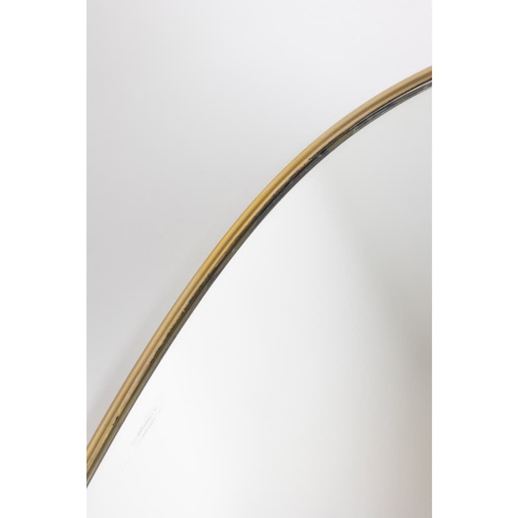 Miroir de forme ovale serti d’une baguette de laiton doré. Années 1970. LS6260509U 7