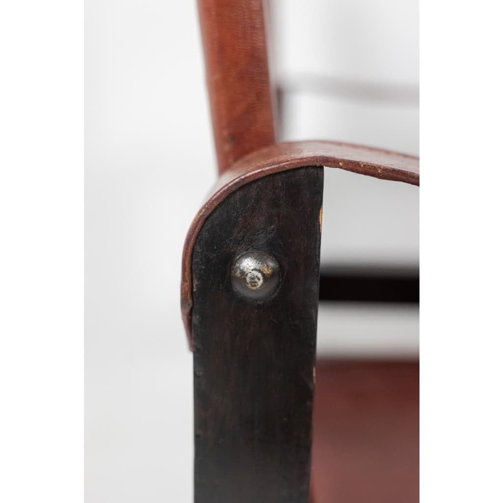 Fauteuil « Safari » en bois et cuir cognac. Années 1960/70. 12
