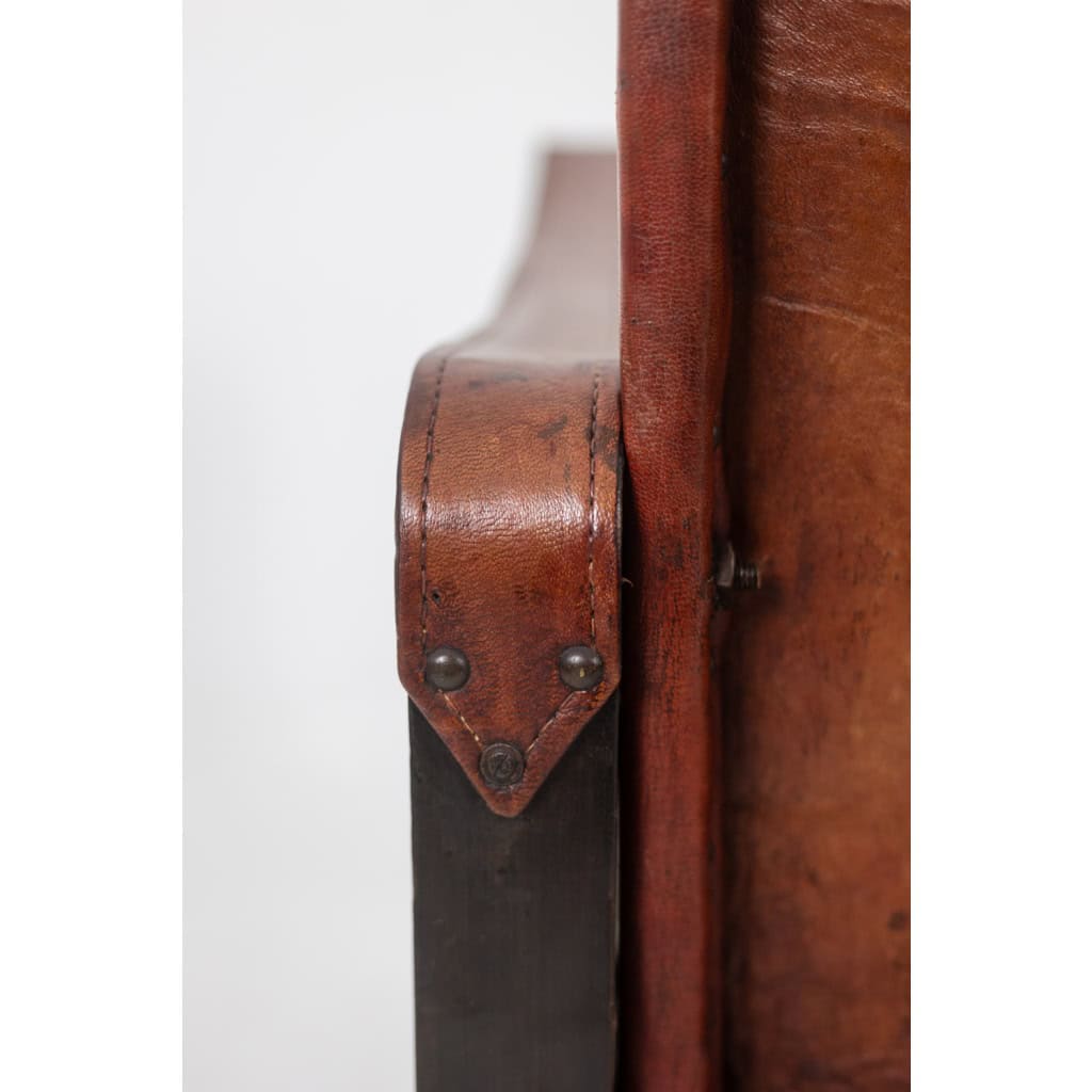 Fauteuil « Safari » en bois et cuir cognac. Années 1960/70. 14