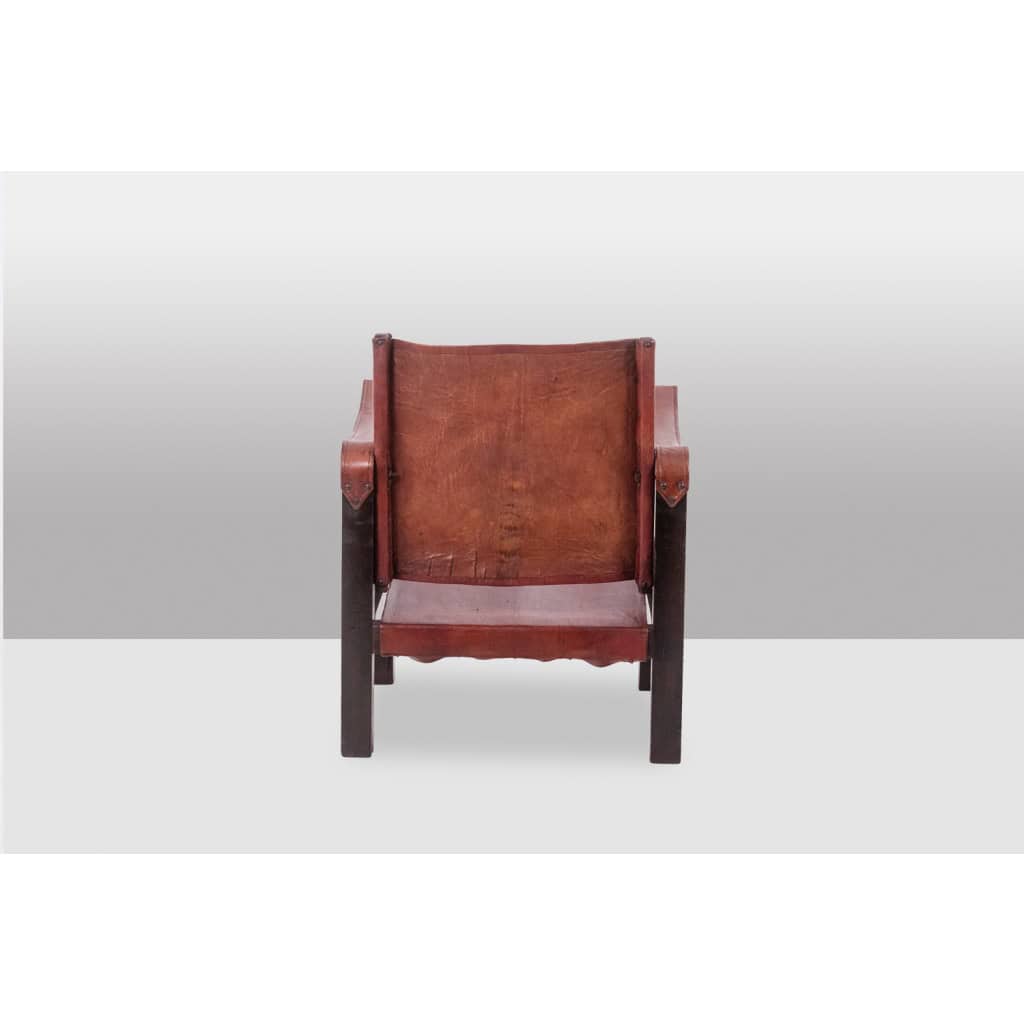 Fauteuil « Safari » en bois et cuir cognac. Années 1960/70. 6