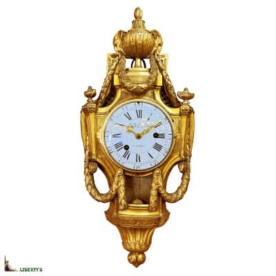 Cartel mural bronze doré au mercure, mouvement signé avec suspension à fil de soie et aiguilles ajourées, signé J.B. Dutertre à Paris, haut. 71 cm, (Mi. XVIIIe)