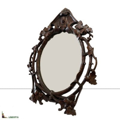 Grand miroir en bois sculpté, 41 cm x 55 cm, (Fin XIXe)