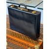Mallette Hermes en cuir noir 33