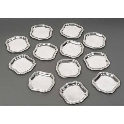 Bloch Eschwege – 12 plats en argent massif style Louis XV