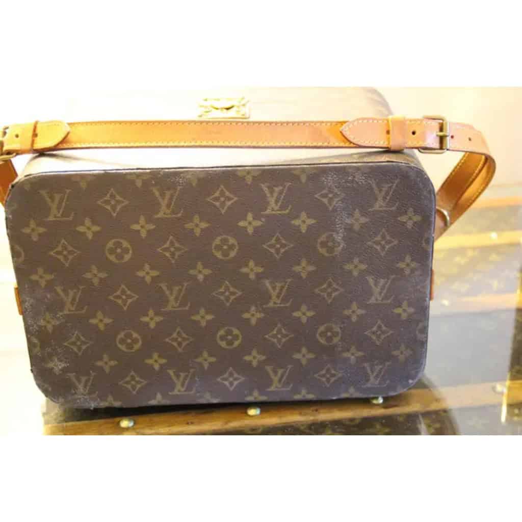 Vanity case Louis Vuitton à bandoulière. 10
