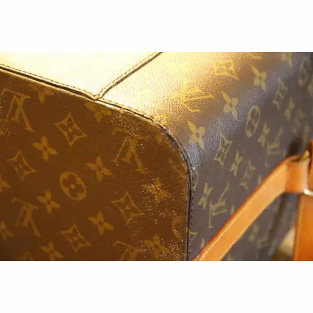 Vanity case Louis Vuitton à bandoulière. 13