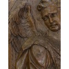 Paire de panneaux en bois sculpté d’anges musiciens. 20