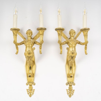 Paire d’appliques à décor de cariatides ailées, d’époque Empire. XIXème siècle