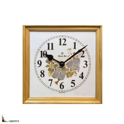 Pendule murale quartz avec fleurs naturelles Pierre-Bex, 23 cm x 23 cm (1980-1990) Pendule murale quartz avec fleurs naturelles Pierre-Bex, 23 cm x 23 cm (1980-1990)